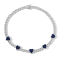 Detailed macro view of silver Cuban link chain with five blue heart zircons and pavé diamonds - Necklace / Blue Zircon Heart Silver