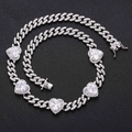 Macro view of silver Cuban chain necklace with heart zircon stones and pavé crystals - Necklace / White Zircon Heart Silver