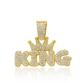 Macro view of iced out KING pendant with crown and shimmering diamonds on Cuban chain - Gold Pendant Only