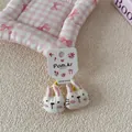 Detalle de los coleteros de conejo de peluche con mejillas rosas y gomas amarillas - Estilo Coletero / Goma de Pelo Conejo Blanco