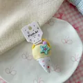 Detail of ice cream fabric hair tie with star charm and polka dot pattern for girls - Yellow Ice Cream Hair Tie (NK1722)