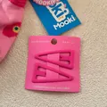 Close-up of two matte pink triangle hair clips on a display card for bangs styling - Rose Red (2)