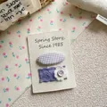Detail of purple checkered fabric bow and lace flower hair clips set on paper card - Purple Square Flower Hair Clip