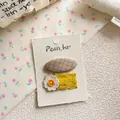 Détail du set de pinces à cheveux avec marguerite en dentelle jaune et motif à carreaux - Barrette Fleur Carrée Multicolore