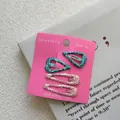 Détail de quatre barrettes à paillettes scintillantes en forme de cœur et de goutte - Style 4 : Cœur Bleu Vert et Goutte d'eau Rose Pâle