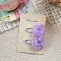 Detail of two lavender layered organza flower BB hair clips on a cream display card - Purple Floral Hair Pin