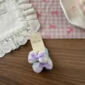 Detail of sweet blue striped bow hair ties with purple accents on display card - Purple Bowknot