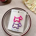 Détail de barrettes à cheveux en forme de chien évidé rose et violet sur une carte blanche - Rose rouge+Violet