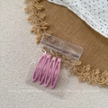 Detail showing set of four pink teardrop metal hair clips in transparent retail packaging - Pink Style