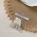 Close-up of four cream matte water drop BB hair clips in transparent OPP packaging - Beige Style / Set of 4