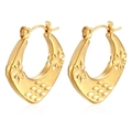 Detailed macro view of 18K gold-plated stainless steel hoop earrings with starburst engraving - Starburst Horseshoe Style (HL-51) / Gold
