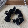 Macro shot of black satin scrunchie with silver bead edges and large square crystal detail - Black Square Rhinestone