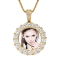 Close-up of gold iced-out photo pendant with round zirconia and twisted rope chain - Gold