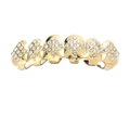 Macro shot van vergulde hiphop grillz met strass steentjes in ruitvormig diamant patroon - Goud Boven