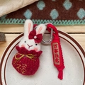 Handmade knitted white rabbit plush keychain in red lucky pouch with silver clasp - Rabbit Doll Style
