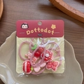 Dettaglio di elastici per capelli rosa con ciondoli carini in confezione regalo - Set Elastici Fiore Ciliegia
