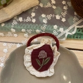 Detail of vintage embroidered burgundy fabric hair scrunchie with white lace flower trim - Embroidered Floral Style / Red Floral Lace Hair Tie