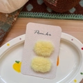 Sweet yellow plush hair clips for girls set on a branded card in a ceramic dish - Yellow