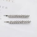 Lot de deux barrettes argentées ornées de strass étincelants avec design en vagues - Argenté