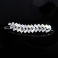 Elegant silver-tone leaf hair clip featuring baguette-cut crystals on a dark mirror - Silver (HS-J6382)
