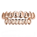 Macro view of polished rose gold plated grillz with upper and lower rows set for hip hop style - Style 1 / Set / Rose Gold