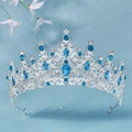 Luxury silver bridal crown featuring deep blue teardrop gemstones and white rhinestones - Silver Base Aqua Blue Stone