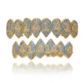 Set grillz denti da vampiro hip hop con zirconi blu e bianchi su base dorata - Set Oro