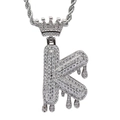 Macro detail of iced-out silver letter K pendant with crown and dripping effect - 3mm*60cm Stainless Steel Rope Chain / Silver K