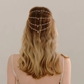 Detailed close-up of multi-layer rhinestone hair chain on model with wavy hair - Gold (HS-J6694G)