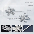 Detailed view of silver flower hair clip with sparkling rhinestones and pearls showing size - Floral Pearl Silver (HS-J6414)