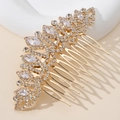 Macro detail of luxury gold bridal hair comb featuring sparkling leaf-shaped crystals - Ten-Tooth Luxury Leaf (HS-J7077G)