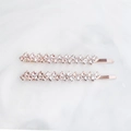 Juego de dos horquillas para el pelo en oro rosa con pedrería brillante sobre mármol blanco - Oro Rosa (HS-J5922RG)