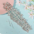 Detail view of silver bridal hairband set with marquise rhinestones on blue background - Silver Handmade Leaf Floral Hair Accessory With 2 Clips (HS-J7144S)
