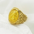 Vintage gold viking ring with intricate hollow patterns and an amber-toned gemstone - US 7 / Gold Band + Yellow Stone