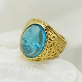 Vintage gold ring with oval light blue gemstone and intricate engraved vine patterns - Gold Band + Blue Stone
