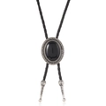 Detail of western bolo tie featuring black agate stone and engraved silver buckle - Black