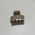 Detail view of mocha brown high gloss hair claw clip with smooth polished surface - Square Bone Style / 5cm / Mocha Brown