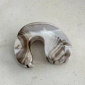 Detailed view of the marble pattern hair claw clip with its curved U-shaped grip design - White Brown Ink Pattern