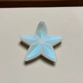 Macro detail of a 3D star-shaped hair claw clip with blue pearlescent glitter filling - Blue Glitter Star Patch Claw Clip