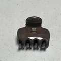 Detail view of glossy brown resin hair claw clip with strong spring and smooth teeth - Square Bone Style / 5cm / Dark Coffee