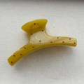 Detailed view of a green hair claw clip with red polka dots on textured fabric - Arc Hair Claw / Extra Large (Approx 12cm) / Yellow