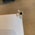 Eleganter transparenter Blumen-Haarclip mit grünem Strass-Zentrum für Damen - Transparent
