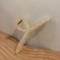 Minimalistische beige doorschijnende haarklem met kruisontwerp en gouden veer - Gelee Gebroken Wit