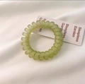 Matte light green spiral hair tie with a smooth telephone cord design for women - Green