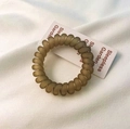 Matte brown spiral hair tie with seamless telephone cord design in amber finish - Gray