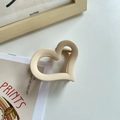 Minimalist heart-shaped hair claw clip with matte cream finish for elegant daily styling - Off White