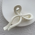 Elegante pinza per capelli a fiocco color crema in resina lucida dal design minimalista - Bianco Lucido