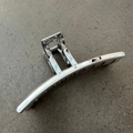 Detailed side view of silver metal hair claw clip featuring geometric arc design and spring - T-Shape (13cm) / Silver