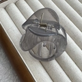 Detail view of a translucent grey pumpkin hair claw clip in a velvet jewelry box - Jelly Grey