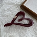 Detail view of burgundy matte heart-shaped hair claw with gold Barrette La-France text - Wine Red Heart Label 13cm
